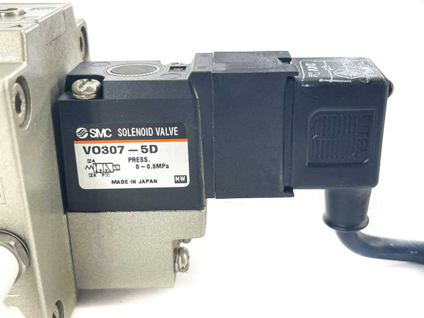 SMC VO307-5D pilot solenoid valve label showing model number and pressure range 0–0.9 MPa, Made in Japan