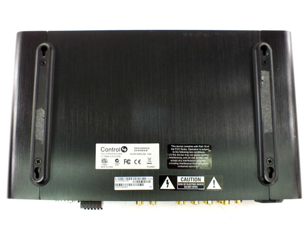 Control4 HC-300 bottom panel showing FCC compliance label, serial number barcode, Control4 branding, and regulatory markings