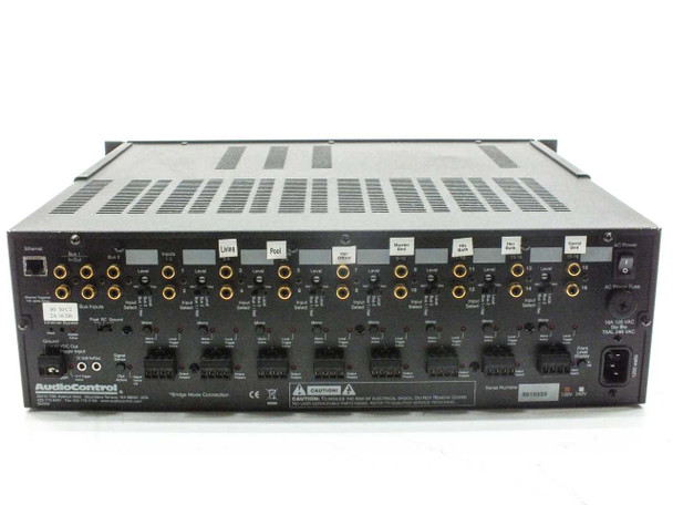 AudioControl D4400 Director rear panel close-up — full rear I/O layout with labeled zone inputs, Bus 1 and Bus 2 connectors, Ethernet, 12V trigger, speaker outputs, and IEC AC power