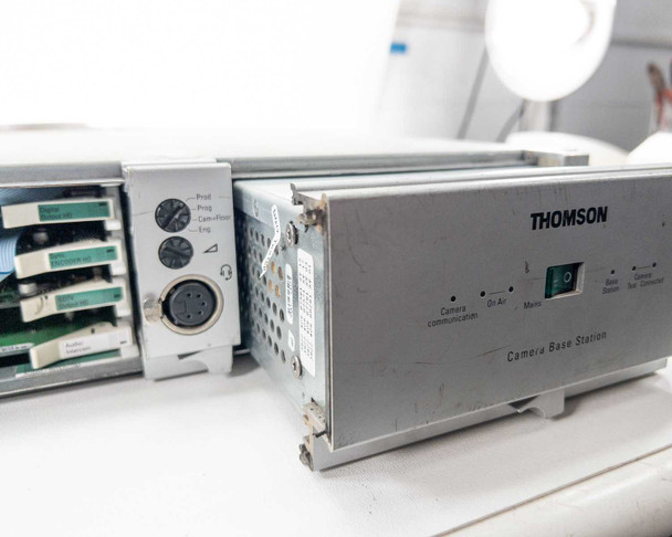 Grass Valley Thomson 8926 Camera Base Station – side angle showing Thomson front panel with Camera Communications, On Air, Marks indicators and power switch
