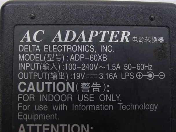 Delta Electronics ADP-60XB label — shows 19V 3.16A output, 100-240V 1.5A 50-60Hz input specs