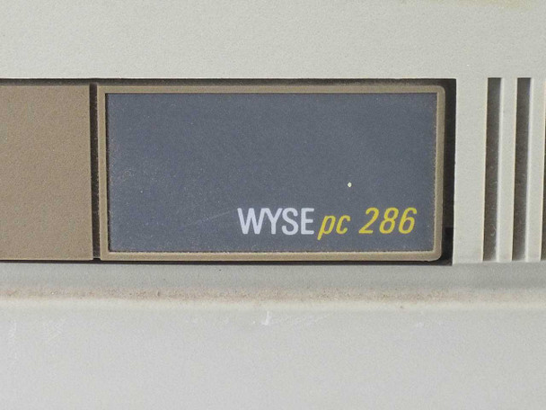 Wyse PC 286 front panel badge close-up reading 'WYSE pc 286'
