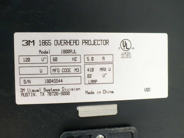 3M 1865 Overhead Projector 1800AJL — rating label showing Model 1800AJL, 120V 60Hz 5.0A, 410W max, 82V lamp, MFG Code M3, S/N 18045544, UL Listed, Made in China