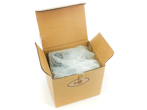 RSF cardboard box open showing bubble-wrapped InFocus LAMP-021 lamp inside