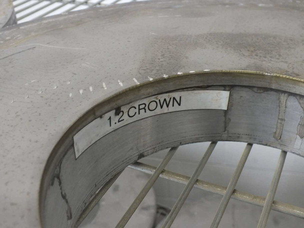 Rim close-up showing a white label marked '1.2 CROWN' on a Lapmaster lapping plate