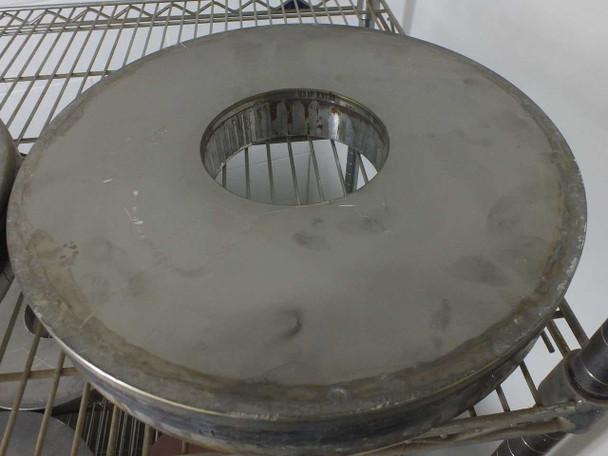 Top view of a light gray Lapmaster lapping plate with smooth abrasive surface and center bore — good surface condition