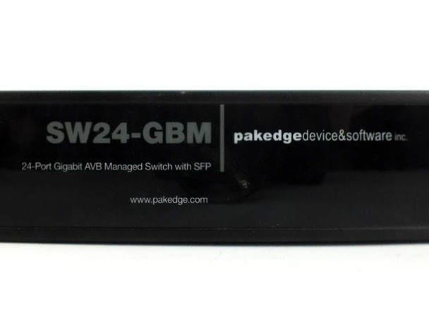 Pakedge SW24-GBM front panel label closeup — reads '24-Port Gigabit AVB Managed Switch with SFP' by Pakedge Device and Software Inc.