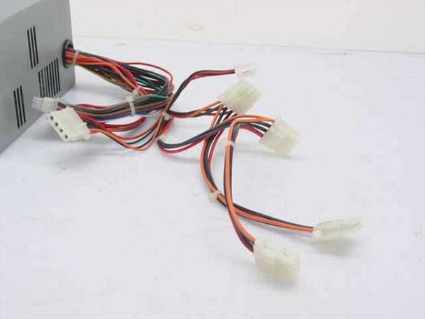 Compaq PS-6151-6C2 power supply – close-up of output wiring harness showing Molex 4-pin drive power connectors and smaller auxiliary connectors