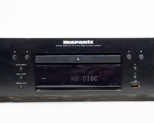 Marantz UD5007 front panel close-up showing Pure Direct, Disc Layer, and Resolution buttons on left; NO DISC on display; USB 5V/1A port on right