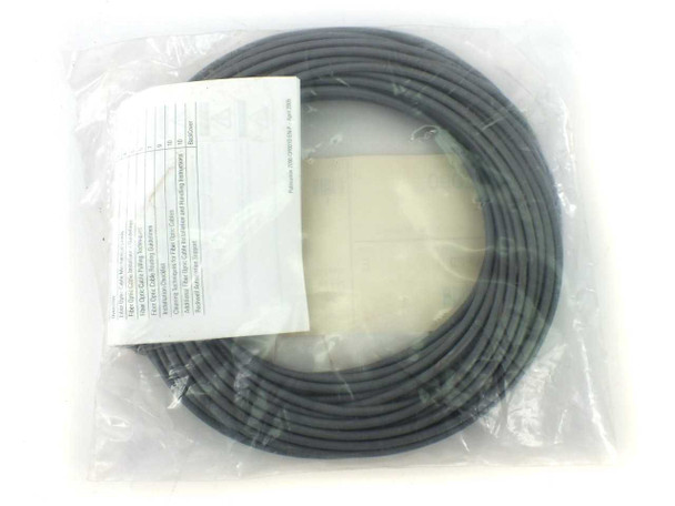 Allen-Bradley 2090-SCVP20-0 20-meter plastic fiber optic SERCOS cable coiled in original sealed packaging with spec sheet insert