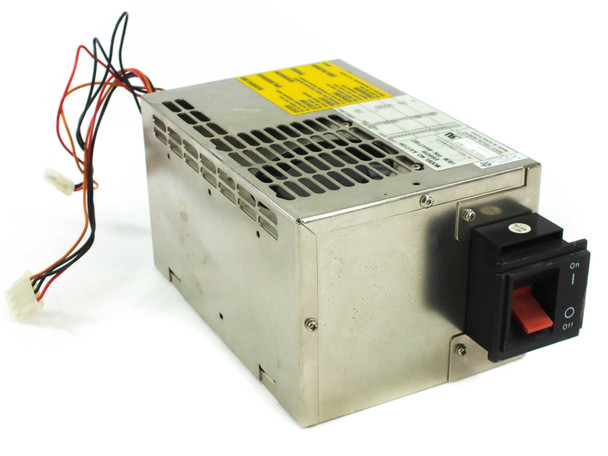 IBM 6447192 AA12156 AT power supply — front-right angled view showing stainless steel chassis, yellow rating label on top, output wiring harness, and integrated On/Off rocker switch