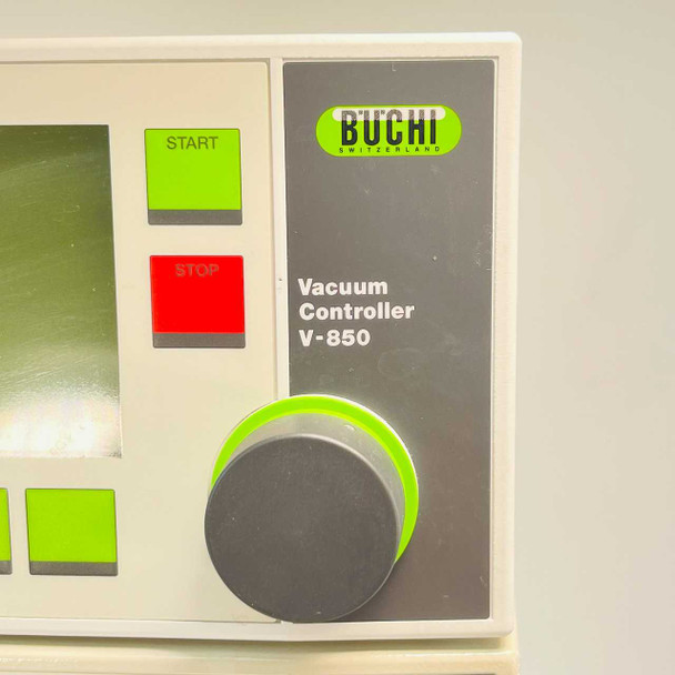Close-up of Buchi V-850 Vacuum Controller front panel showing START/STOP buttons, LCD display, and adjustment knob