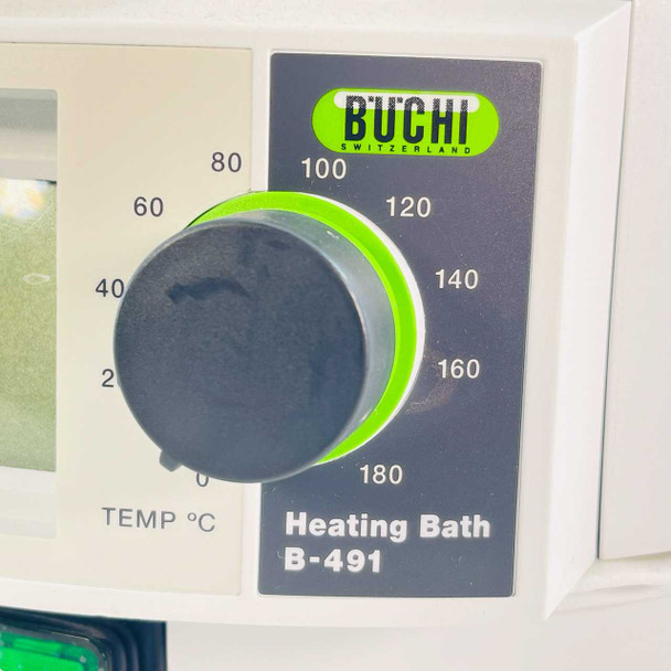 Close-up of Buchi B-491 Heating Bath front panel showing temperature dial scaled 0–180°C and BUCHI label
