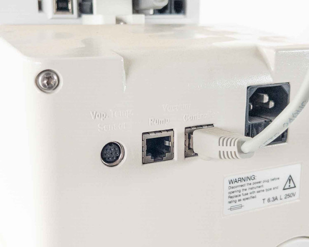 Buchi V-850 Vacuum Controller rear panel showing Vap./Chill Sensor DIN port, Vacuum Pump RJ port, Compress. RJ port, and IEC AC inlet with power cable