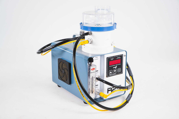 EM Technologies R2S-C.002 microbial air sampler — three-quarter left-rear view showing rear cooling fan, R2S labeling on controller body, and yellow interconnect cables