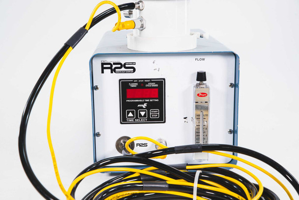 EM Technologies R2S Controller — close-up front panel detail showing digital LED readout, Dwyer rotameter flow indicator with scale markings, and yellow cable connections