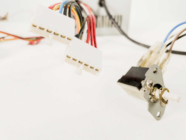 Close-up of dual 6-pin AT motherboard power connectors (P8 and P9) and front-panel power switch assembly