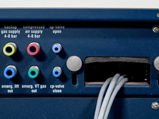 Bruker Cryo Platform Z49290 ECL 02 – rear panel upper section close-up showing push-in gas and air fittings with labels: backup gas supply 4-8 bar, compressed air supply 4-8 bar, cp-valve open, emerg lift out, emerg VT gas out, cp-valve close