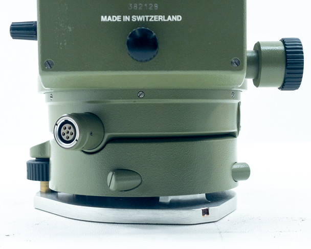 Kern E20 Theodolite base section showing 6-pin circular power connector port and tribrach/leveling base — rear angle