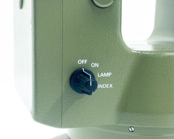 Kern E20 Theodolite side panel close-up showing power switch with OFF/ON/LAMP/INDEX positions