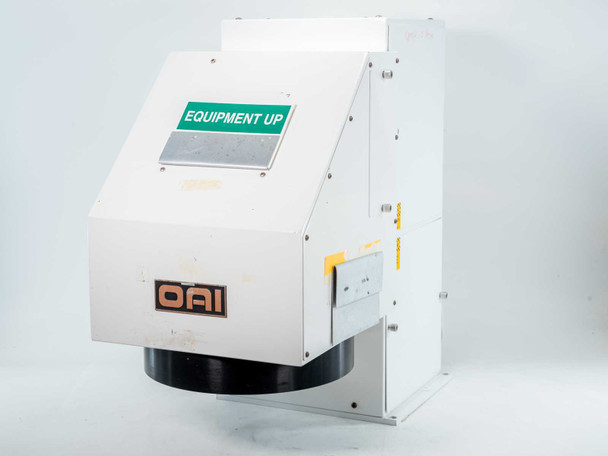 OAI 0130-041-04 UV exposure housing – right-side 3/4 view showing side panel, yellow caution label, and bottom aperture ring