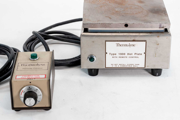 Thermolyne RC1915 Type 1900 Hot Plate front view showing model label and Thermolyne Remote Control box with green indicator light and rotary knob