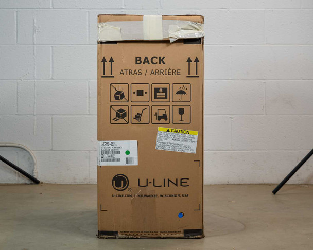 U-Line UHCP115-BS01A clear ice machine shipping box — back panel with U-Line logo and caution refrigerant label