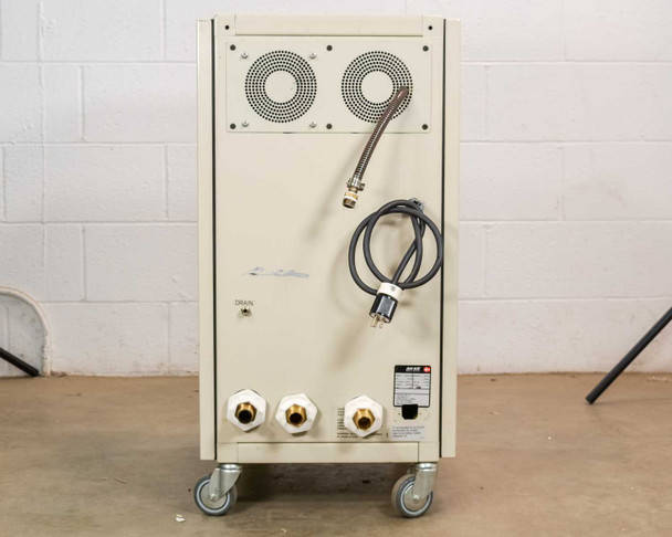 Jun-Air 2000-25M cabinet compressor – front panel detail showing Jun-Air logo badge on gray control fascia
