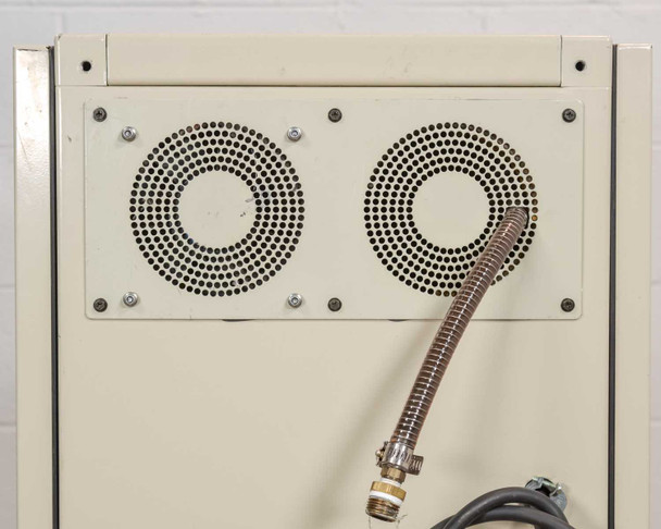Jun-Air 2000-25M – side panel view showing caution label and lower ventilation area