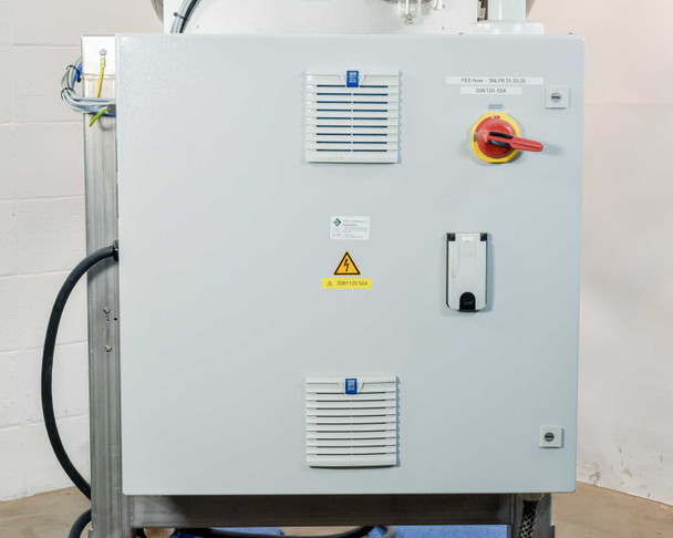 Hoffman CSD20168LG electrical enclosure exterior door showing red/yellow main fused disconnect switch handle, ventilation louvers, and warning labels