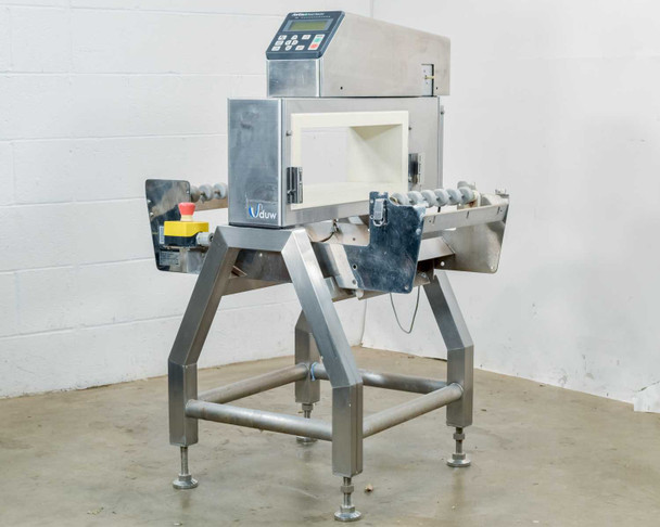 Anritsu KD8125AW conveyor metal detector with KD1125AW head, full system right-side three-quarter view on stainless steel stand