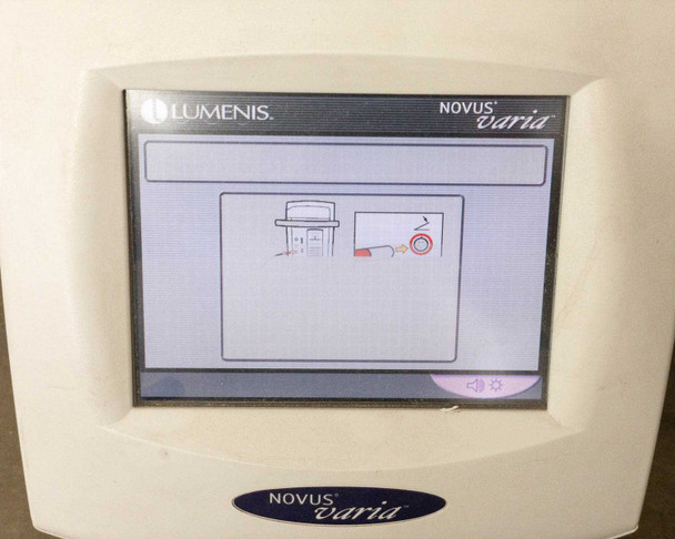 Lumenis Novus Varia touchscreen displaying connection/setup screen with slit lamp and fiber optic cable connection diagram icons