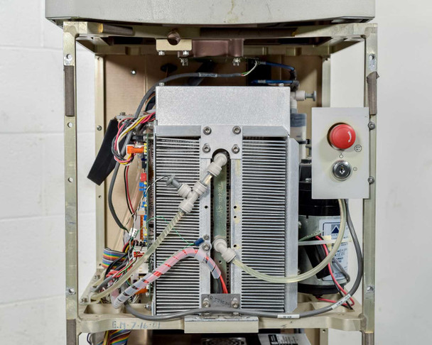Lumenis LightSheer XC – interior close-up of upper chassis showing diode laser stack assembly, heat exchanger, and red emergency stop