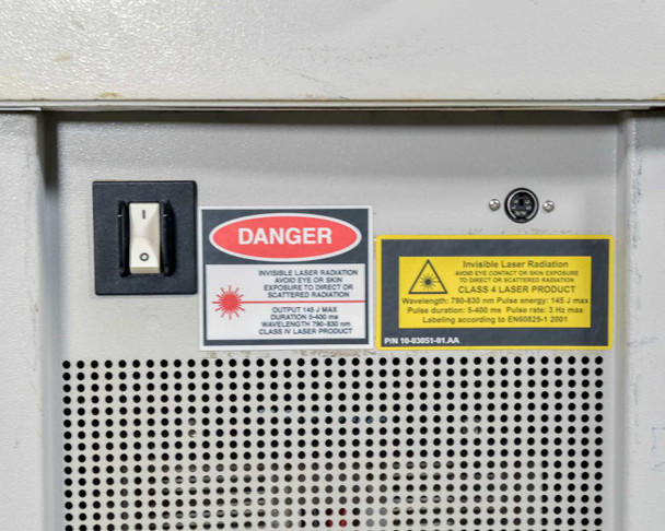 Lumenis LightSheer XC – rear panel close-up showing power rocker switch, Class IV laser danger label, and laser specification sticker (790-830nm, 145J max, 5-400ms, 3Hz)