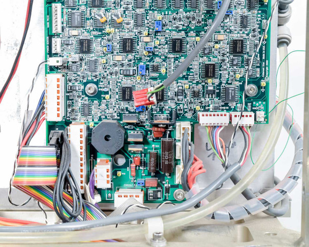 Lumenis LightSheer XC – close-up of main control PCB showing populated circuit board with ICs, connectors, and wiring harnesses