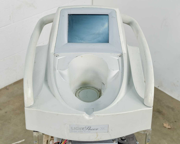 Lumenis LightSheer XC – top-down view showing handpiece cradle, LightSheer XC badge, and touchscreen display