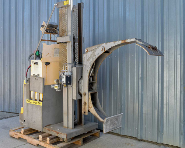 Easy Lift Equipment RCR70048LRCRSP-S Electric Roll Hauler – right side view showing roll clamp and mast, unit on pallet