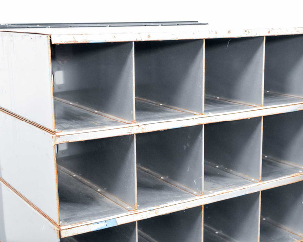 Salsbury 3620 mailbox interior close-up – open unit showing row of mail compartment bays and metal construction
