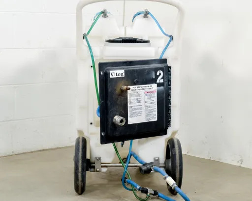 Ecolab FI-EZB-15NV-ECO Foam Unit – rear view showing Viton pump enclosure panel marked '2' with hose connections and large rear wheels
