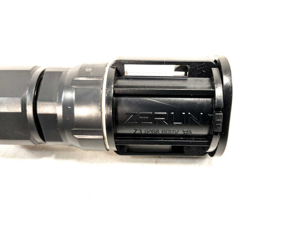 Close-up of ZERUN connector barrel showing 2A IP68 80V markings on cable connector
