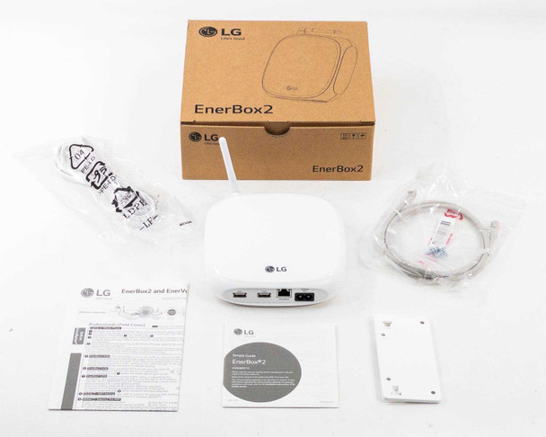 LG EnerBox 2 HGQQMSD10 solar monitoring gateway shown with original box, LAN cable, power cable, wall mount bracket, setup guide, and quick start guide