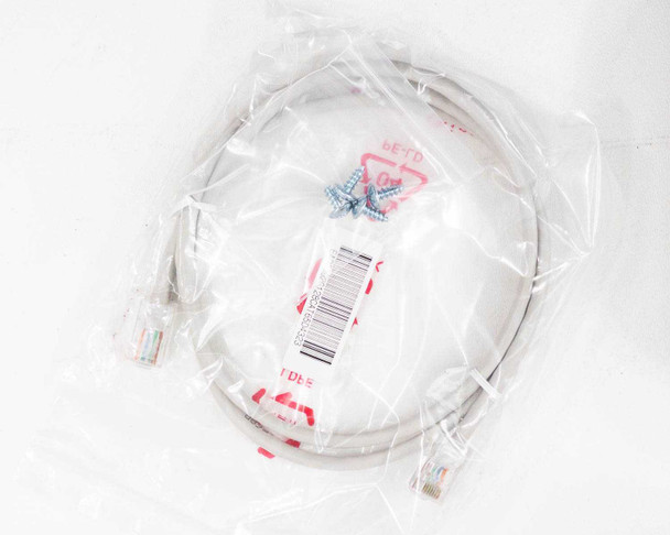 Included LAN Ethernet cable in sealed plastic bag alongside installation screws