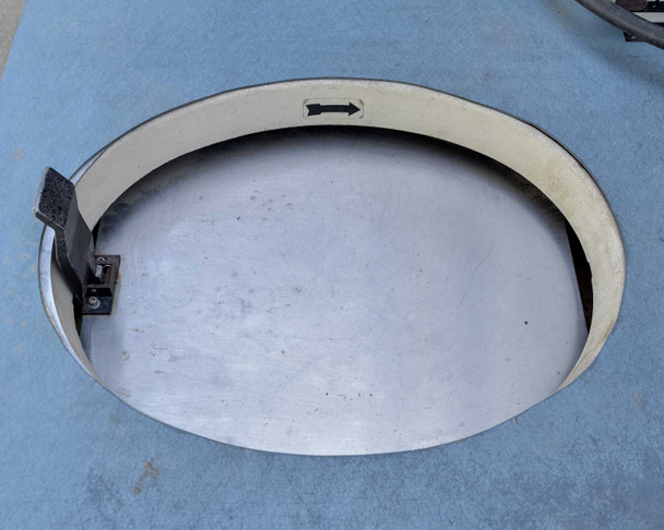 Beckman L5B-CT rotor chamber lid open showing oval stainless steel rotor cavity and latch mechanism