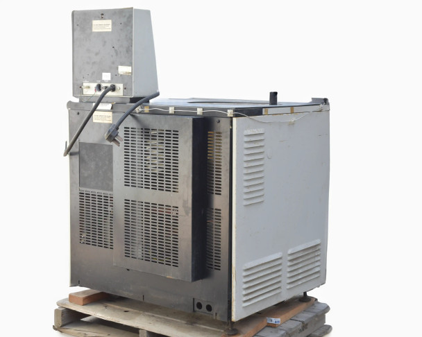 Beckman L5B-CT rear-left view showing louvered side and rear panels with control console, pallet base visible