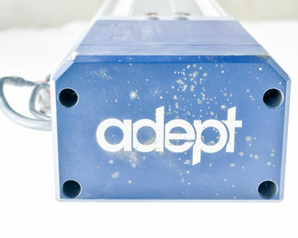 Adept logo end cap view showing white Adept branding on blue housing with mounting bolt holes and cable exit