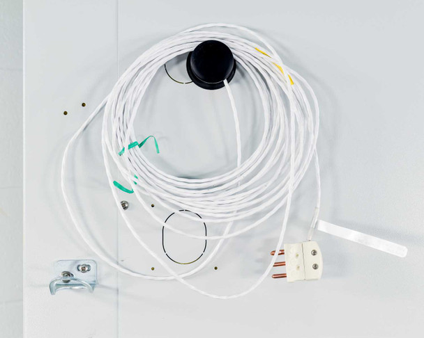 Bundle of sensor cables on rear of unit — including thermocouple connector and multi-wire harness