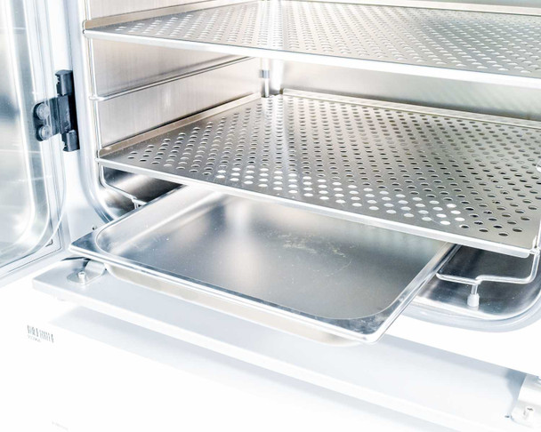 Galaxy 170R interior — lower shelf and stainless condensate/water pan detail