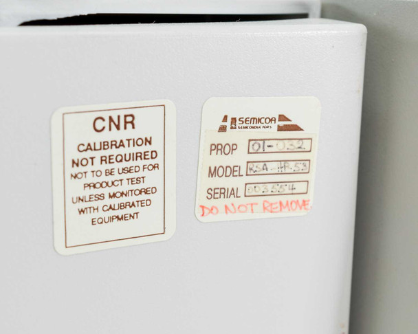 Labsphere RSA-HP-8453 accessory side label showing CNR Calibration Not Required notice and Semicoa property tag with Model RSA-HP-53 and serial number