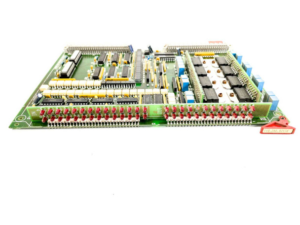 Netstal 110.240.9216A DIO Komplett board – side-angle view highlighting red LED indicator row along bottom edge and blue capacitor bank