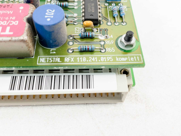 Netstal RFX 110.241.0195 Komplett label and Traco DC/DC converter module on corner of board – close-up view
